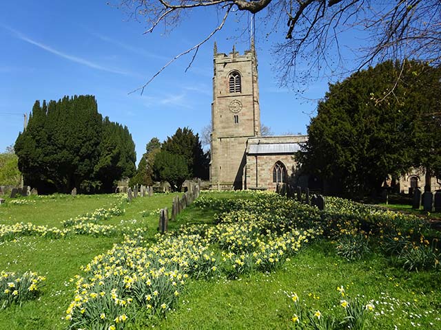 Mayfield Church in Spring with daffodils